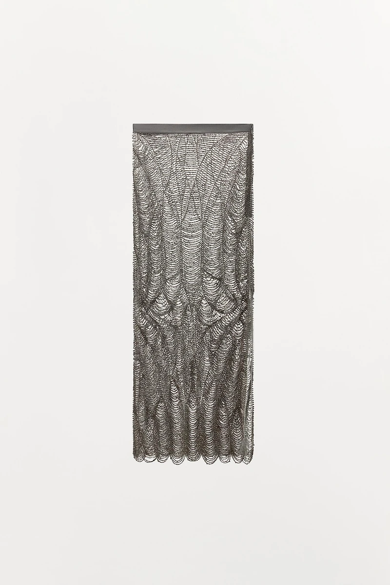 JUPE SEMI-TRANSPARENTE FANTAISIE