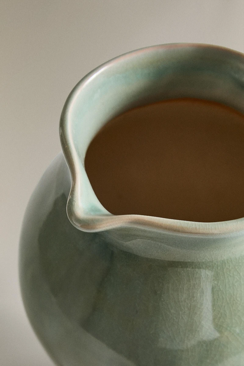 GREENISH CERAMIC VASE