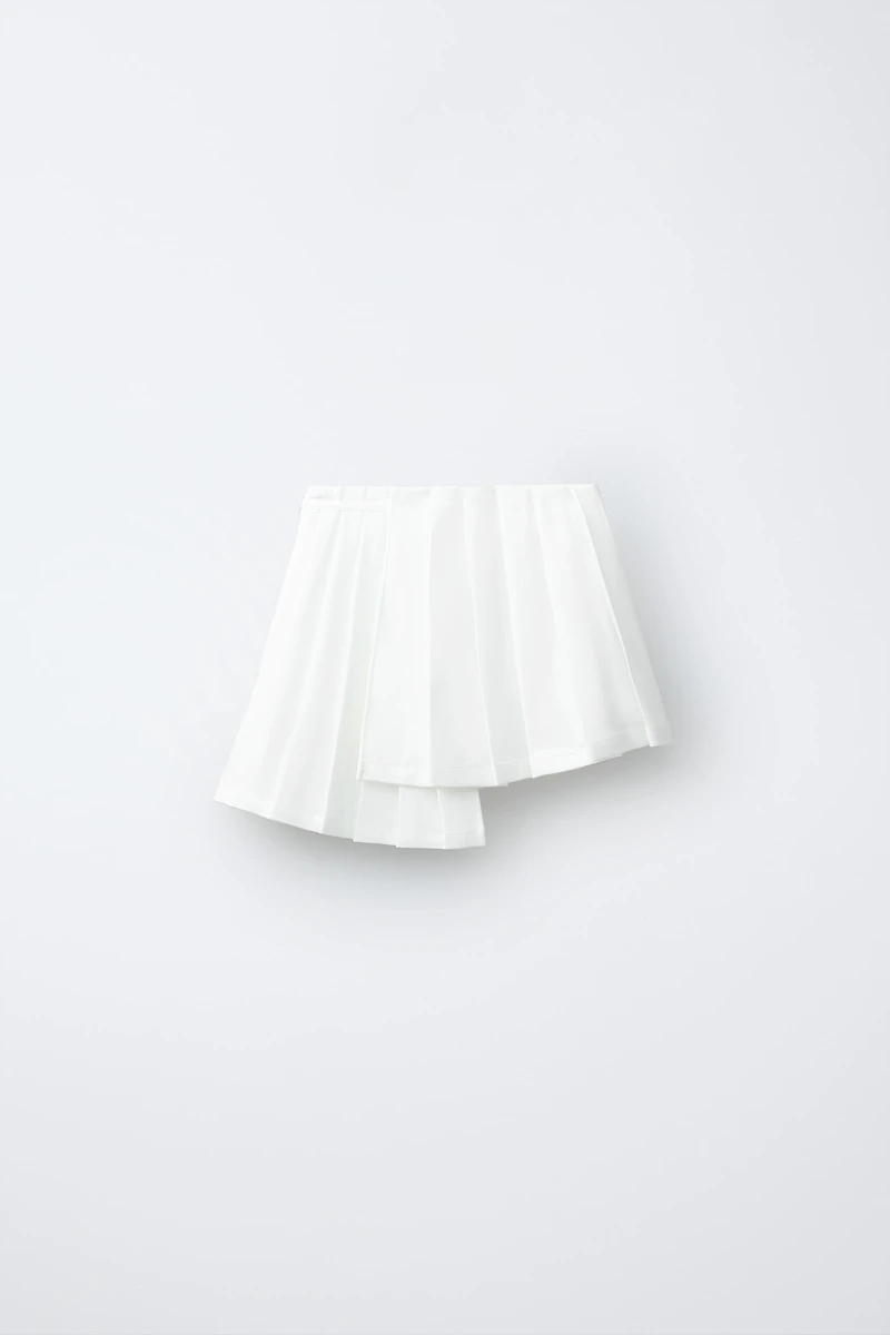 PENN © ASYMMETRIC PLEATED SKIRT