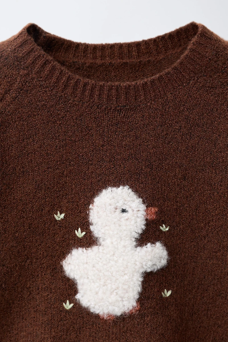 PULL EN MAILLE AVEC CANARD BRODÉ
