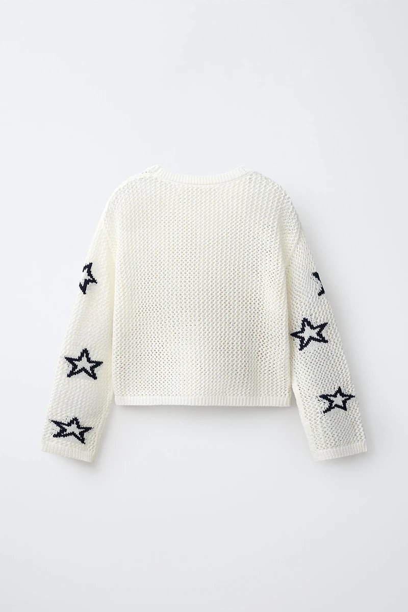 PULL EN RÉSILLE À IMPRIMÉ ÉTOILES