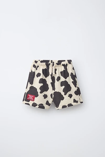 SHORT EN MOLLETON À IMPRIMÉ VACHE