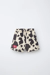 SHORT EN MOLLETON À IMPRIMÉ VACHE