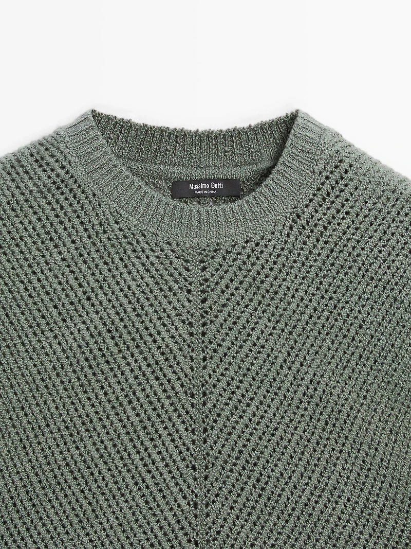 Sleeveless knit top with openwork details