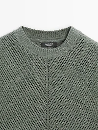 Sleeveless knit top with openwork details