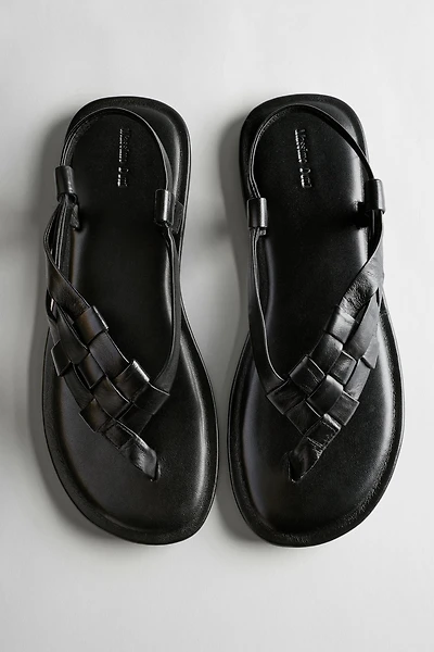Flat woven leather sandals