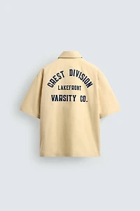 PRINTED TEXT BOXY FIT SHIRT