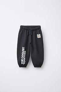 FLOCKED TEXT JOGGER PANTS