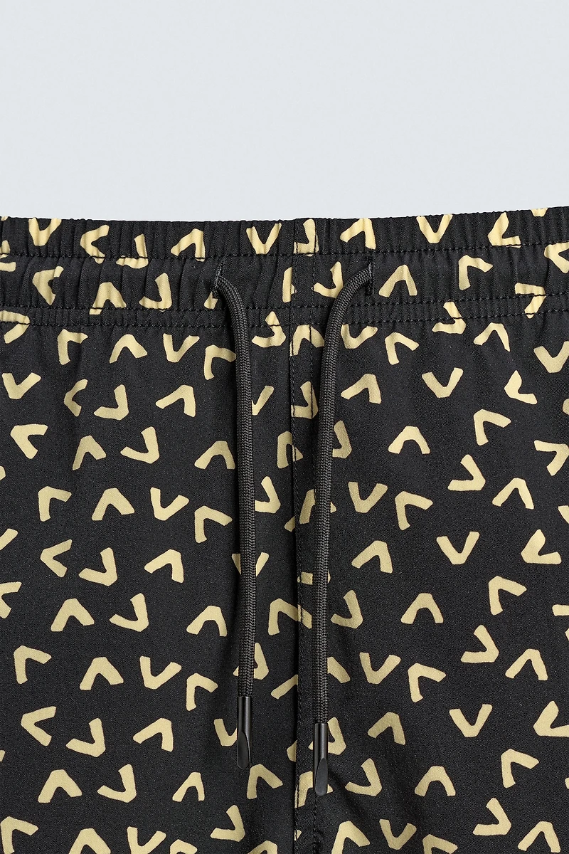 GEOMETRIC PRINT SHORT SWIMSUIT