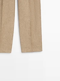 Flowing linen trousers with darts