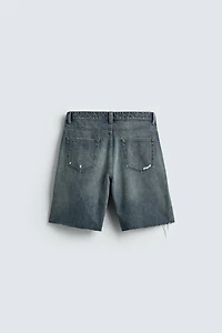 BERMUDA EN DENIM DÉCHIRÉ