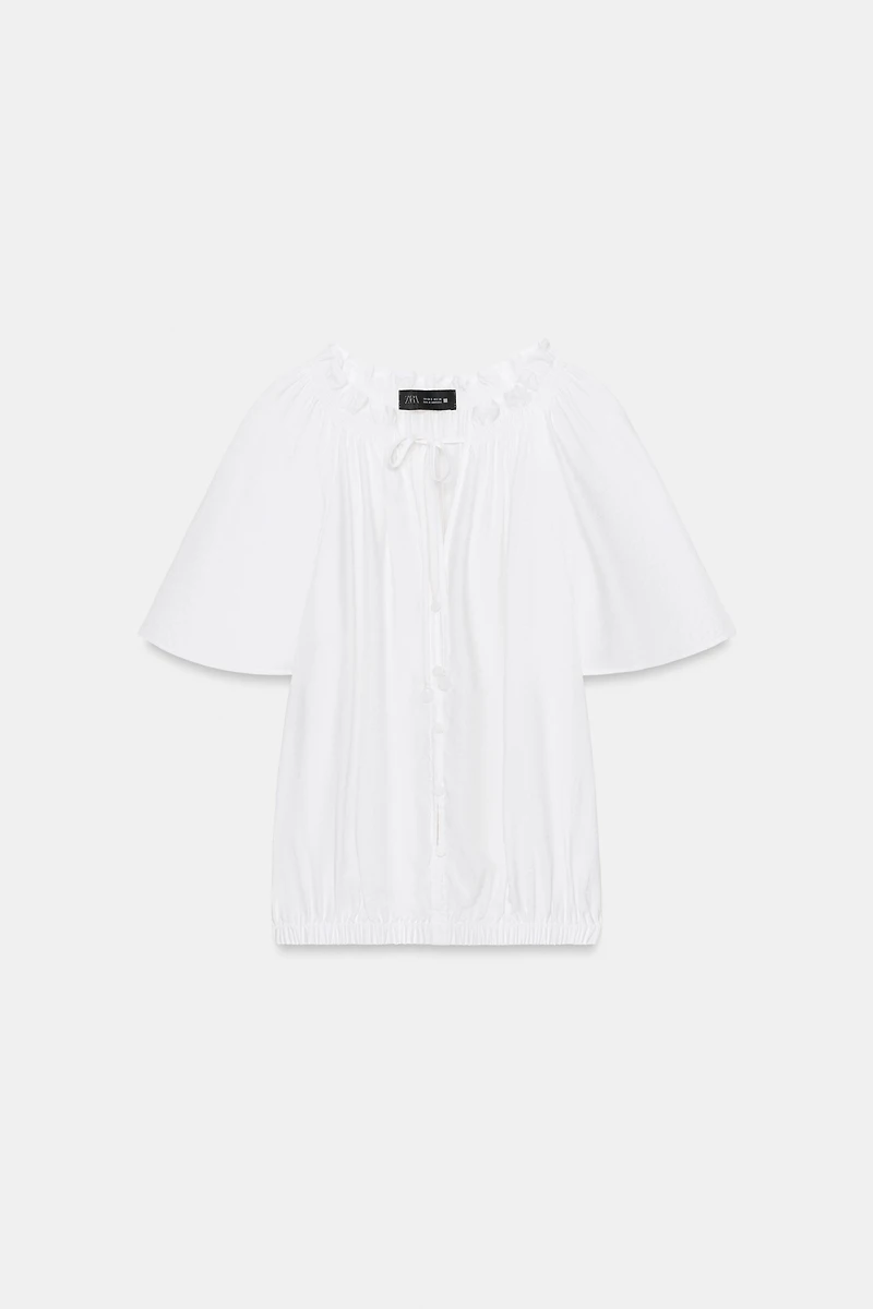 BLOUSE ROMANTIQUE À VOLANT