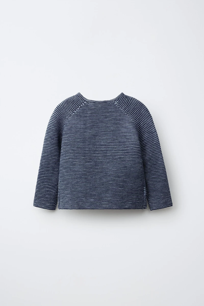 PULL EN MAILLE À RAYURES CROISÉ