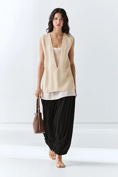 Flowing double-layer top with contrast detail