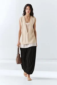 Flowing double-layer top with contrast detail