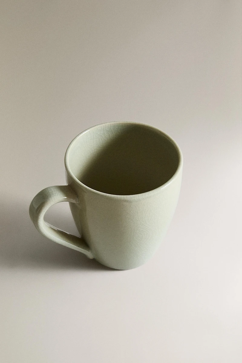 ENAMELED STONEWARE MUG
