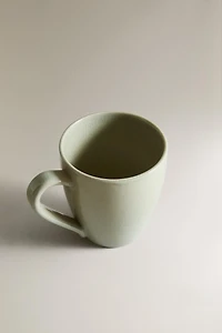 ENAMELED STONEWARE MUG