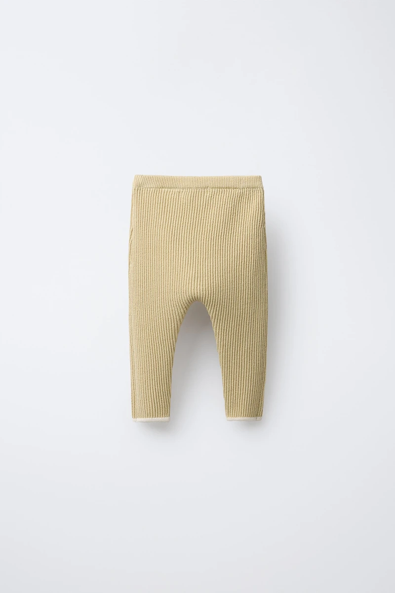 PANTS WITH CONTRASTING PIPING