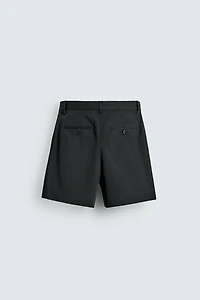 SHORT PLISSÉ COURT AARON LEVINE X ZARA