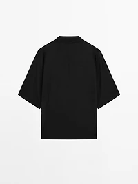 Flowing cape-style polo shirt