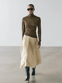 Flowing midi skirt with ruffles