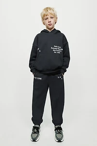 TEXT PRINT JOGGING PANTS