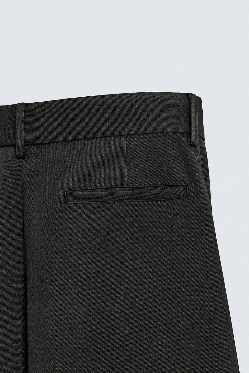 PLEATED WIDE FIT PANTS