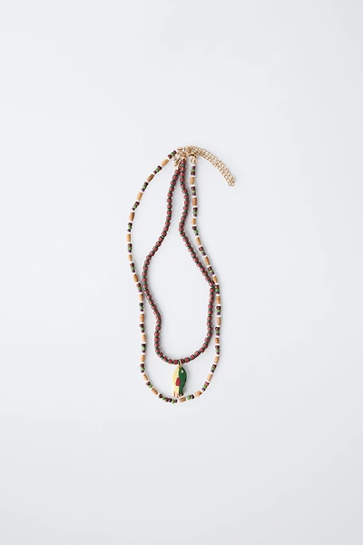 TWO-PACK OF BEADED FISH NECKLACES