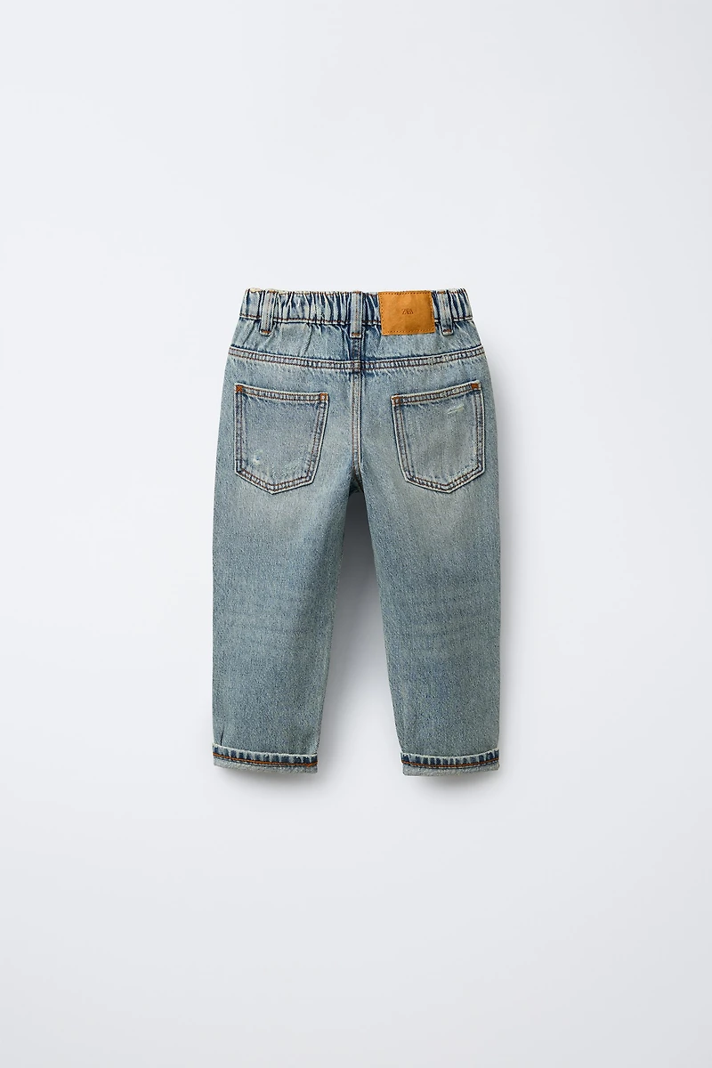 JEAN BAGGY DÉCHIRÉ