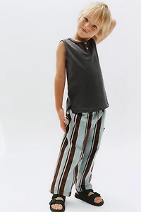 T-SHIRT SANS MANCHES BOUTONS
