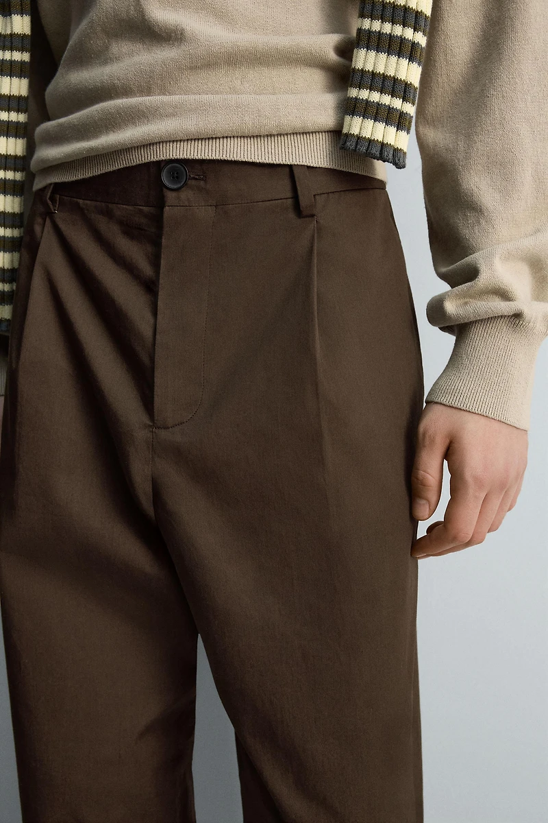 LIMITED EDITION PLEATED CHINO PANTS