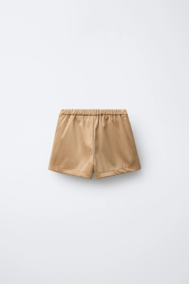 JUPE-SHORT EFFET DAIM À CLOUS