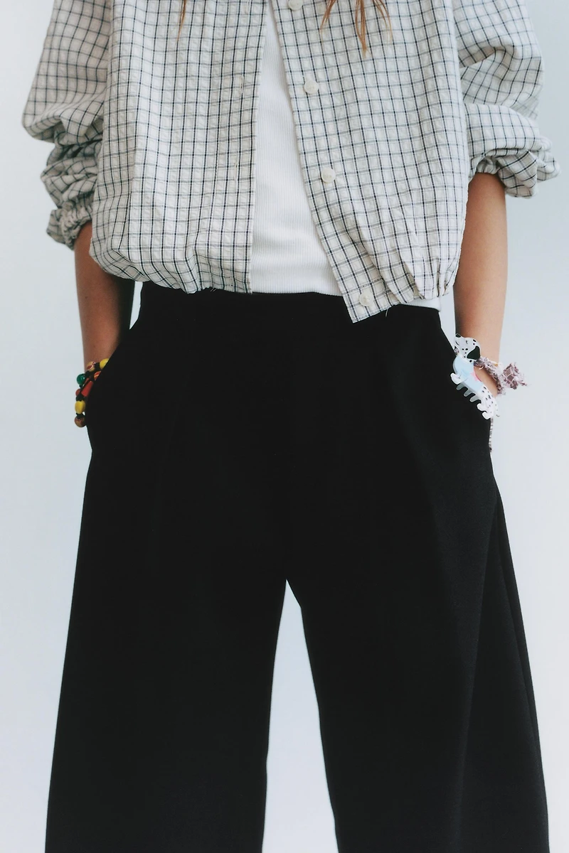 CRISS-CROSS WAIST PANTS