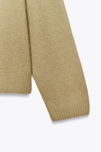 PULL BASIQUE EN MAILLE 100 % LAINE COL V