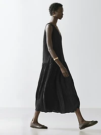 Robe midi fluide plissée