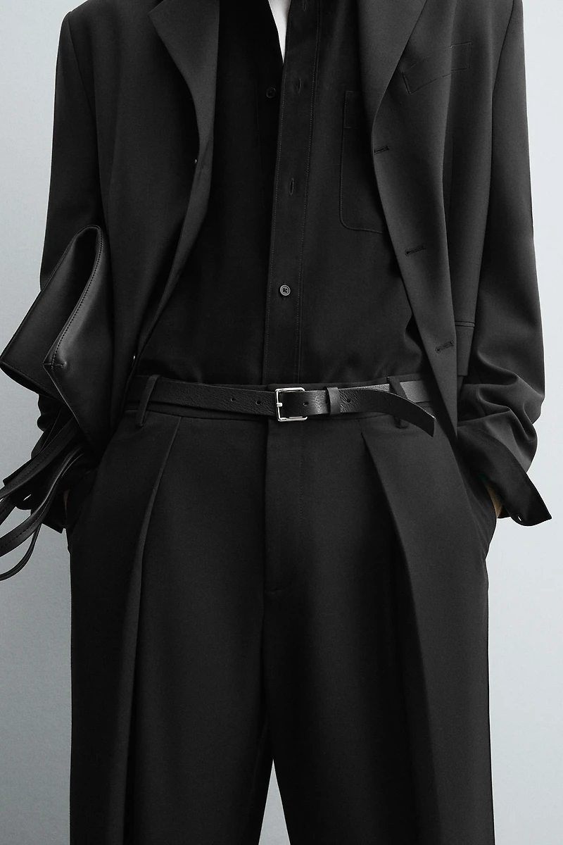 PINSTRIPE PLEATED PANTS