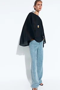 Asymmetric flowing cape