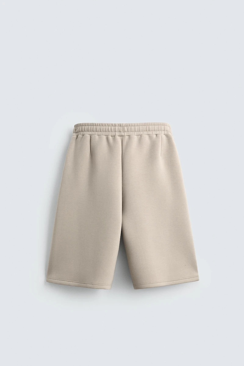SHORT LONG EFFET NÉOPRÈNE À PINCES