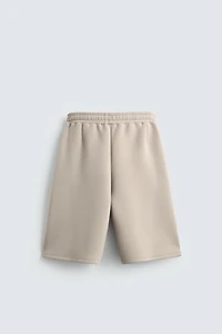 SHORT LONG EFFET NÉOPRÈNE À PINCES