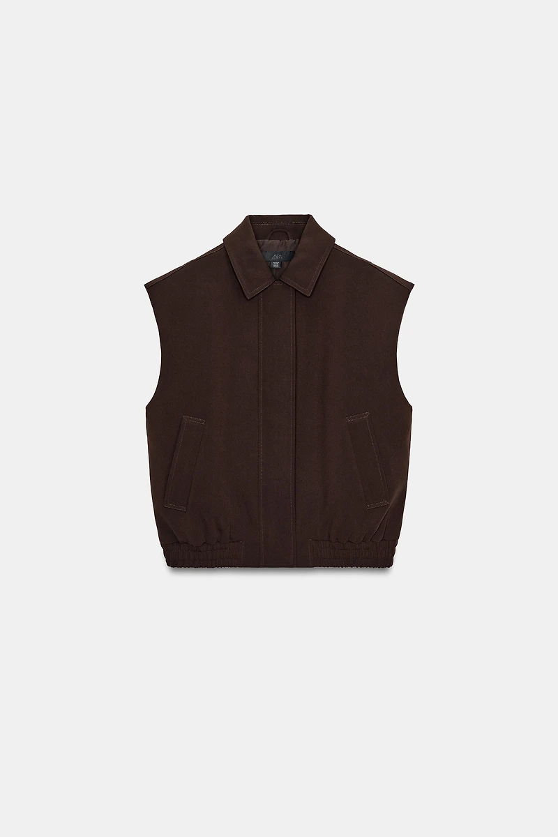 ELASTIC HEM SHOULDER PAD VEST