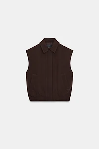 ELASTIC HEM SHOULDER PAD VEST