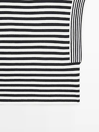 Veste sans manches à rayures et col rond