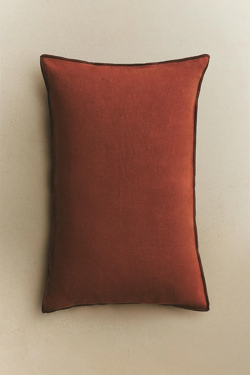 HOUSSE DE COUSSIN OVERLOCK