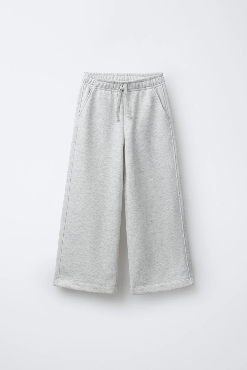 PANTALON EN MOLLETON À JAMBES LARGES ÉTOILES