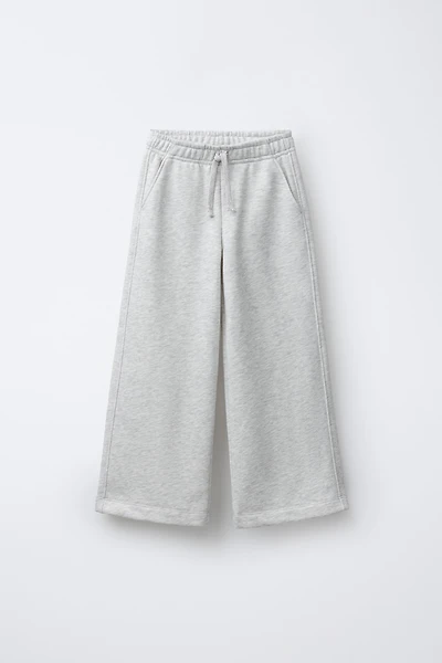 PANTALON EN MOLLETON À JAMBES LARGES ÉTOILES