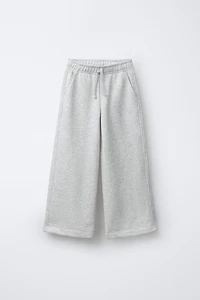PANTALON EN MOLLETON À JAMBES LARGES ÉTOILES