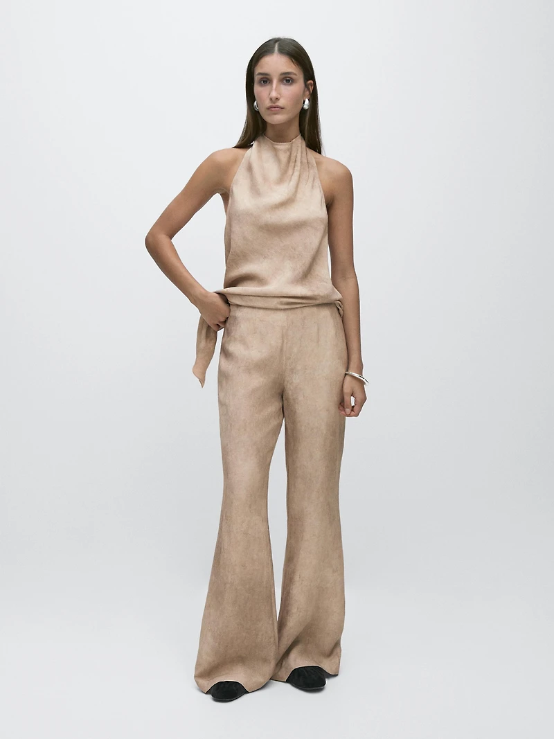 Distressed-effect flowing trousers