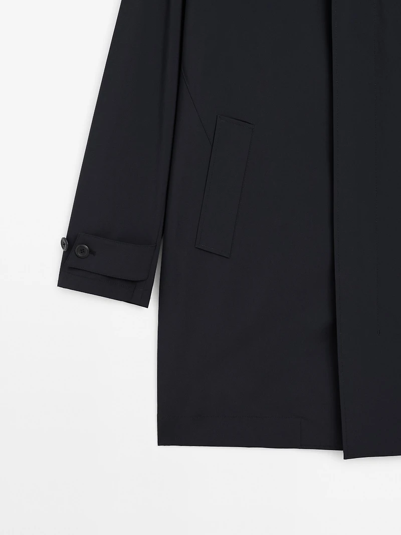 Lightweight trench coat with hidden buttons