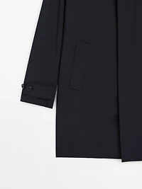 Lightweight trench coat with hidden buttons