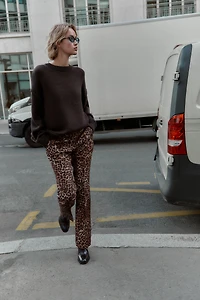 ANIMAL PRINT FLARE PANTS